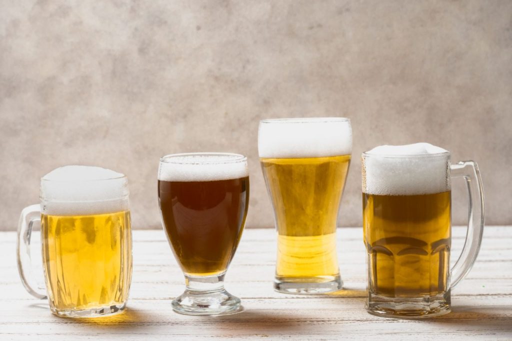 different shape glasses with beer table 1024x682